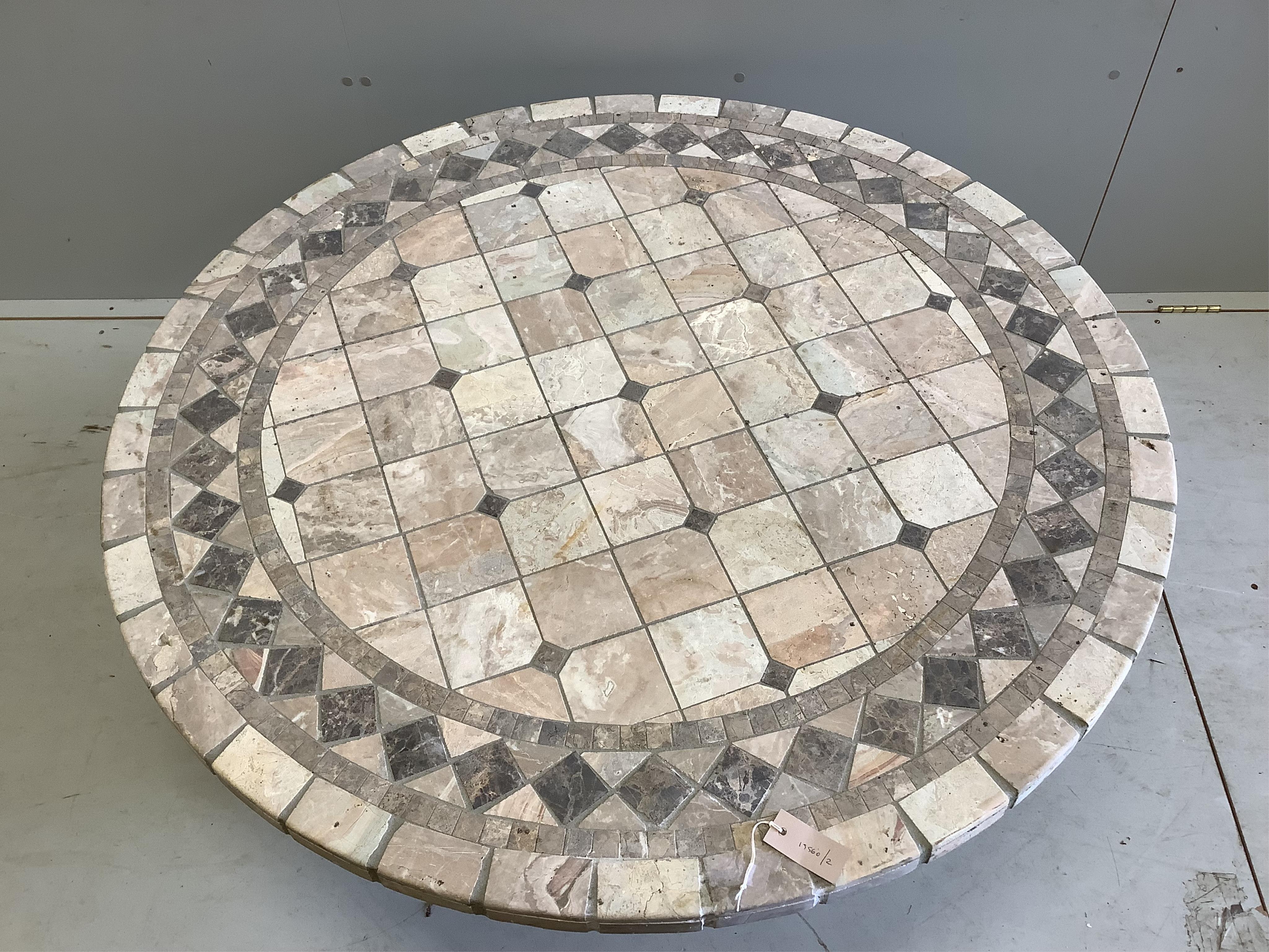 A hardstone mosaic top coffee table with reconstituted stone base, diameter 121cm, height 47cm. Condition - fair